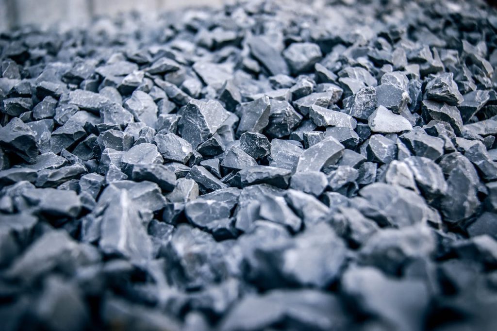 focus-photo-of-gray-stones-237950 Detailed view of jagged grey stones, highlighting texture and natural pattern.
